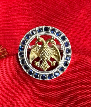 The Rujuta Silver Gandaberunda Adjustable Finger Ring (Blue- 2 Tone)